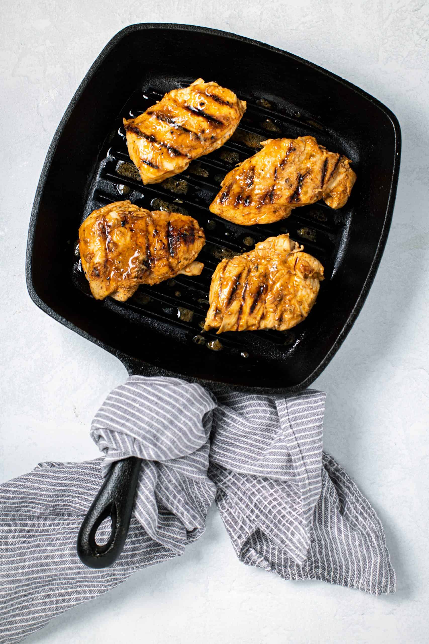 greek marinated chicken breast in grill pan