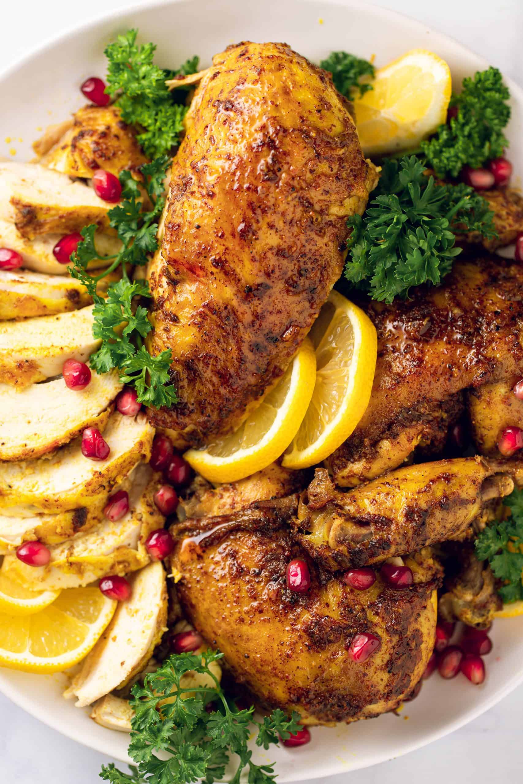 Marco photo of roasted chicken with parsely, lemon, & pomegranate