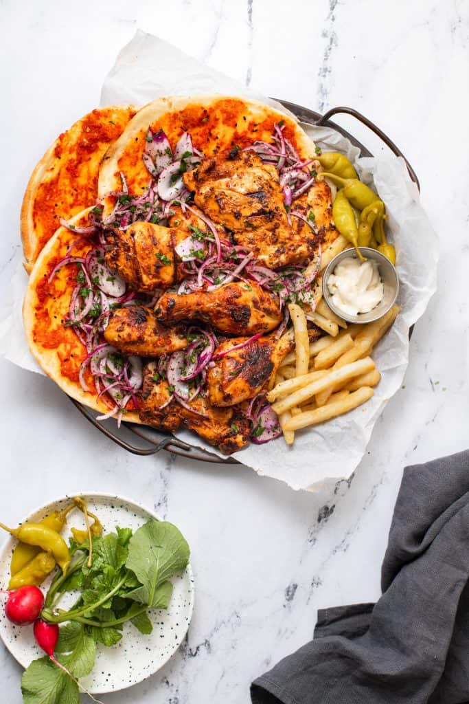 BBQ chicken and Flatbread platter with french fries and pickled peppers